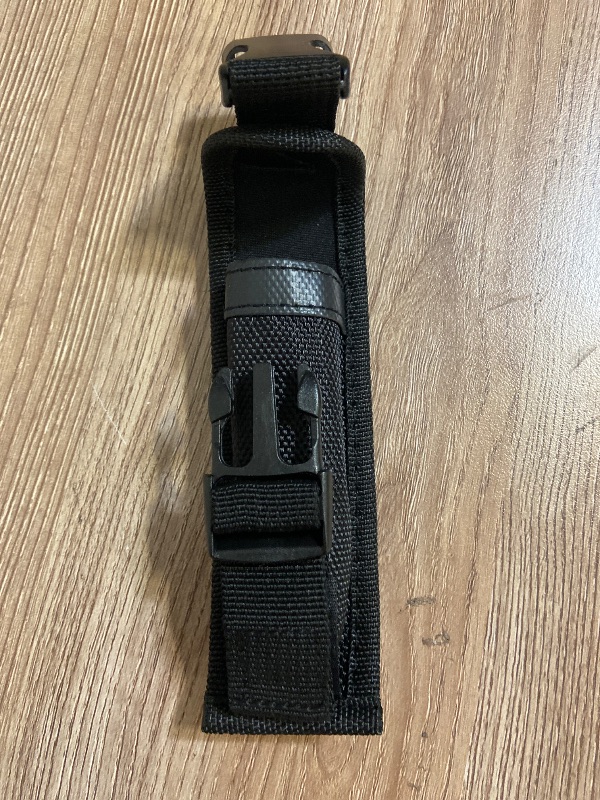 Photo 1 of *5inx1in Black nylon knife sheath featuring a plastic quick-release buckle and an integrated belt loop on the back
