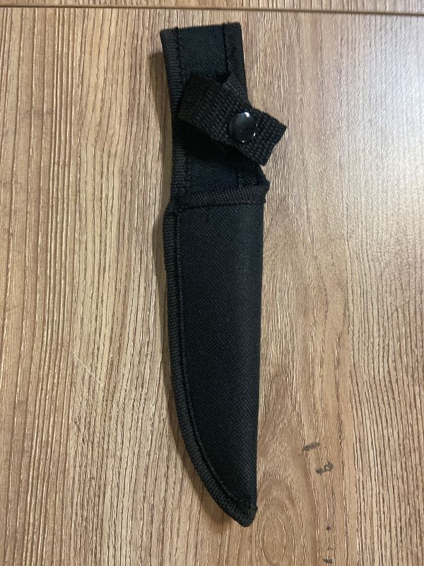 Photo 1 of *8in Generic black nylon sheath designed for a straight or fixed-blade knife.