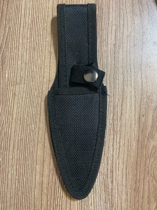 Photo 1 of *8in 2 Pack black nylon sheath designed for fixed-blade knives, often included with sets like the Perfect Point throwing knives