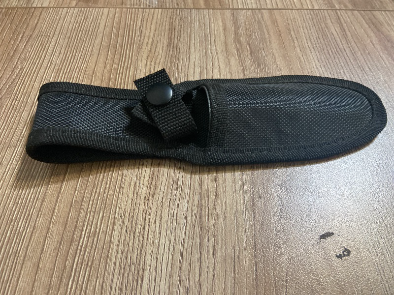 Photo 1 of *8in 2 Pack black nylon sheath designed for fixed-blade knives, often included with sets like the Perfect Point throwing knives
