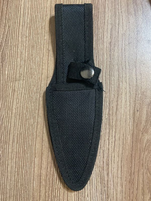 Photo 1 of *8in 2 Pack black nylon sheath designed for fixed-blade knives, often included with sets like the Perfect Point throwing knives