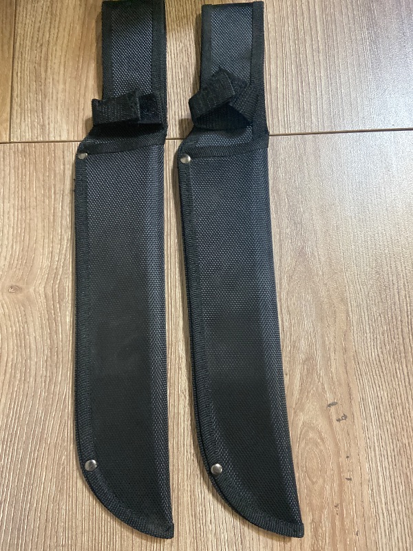 Photo 1 of 2pack black nylon machete sheath, designed for a fixed-blade tool with a slightly curved or "bush" style