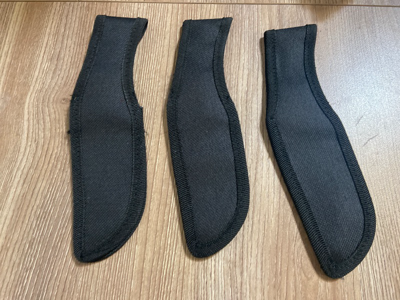 Photo 1 of 3pack black nylon sheaths are designed for holding tactical throwing knives and feature adjustable Velcro straps.