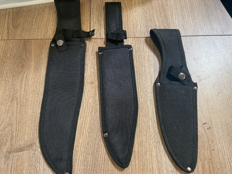 Photo 1 of 3 pack Black nylon sheaths are designed for secure carry and protection of fixed-blade knives