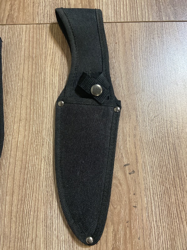 Photo 1 of 3 pack Black nylon sheaths are designed for secure carry and protection of fixed-blade knives