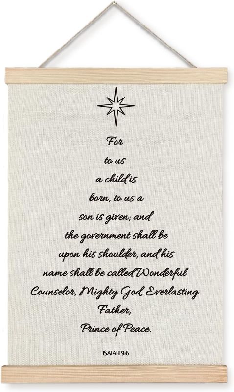 Photo 1 of Canvas wall hanging features the Christian Bible verse Isaiah 9:6 formatted to resemble a Christmas tree.
