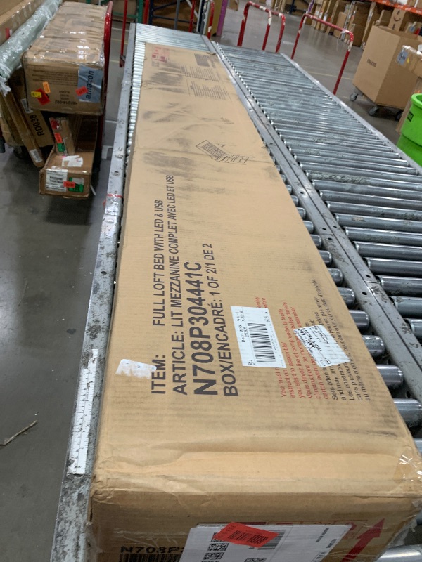 Photo 1 of **Box One of Two** Full Size Wooden Bunk Bed with Adjustable Desk, Wardrobe, Ample Storage, and RGB Lighting in Blue