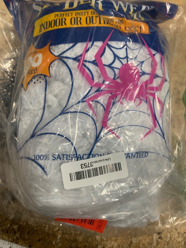 Photo 1 of 1400 sqft Halloween Spider Webs Decorations with 150 Extra Fake Spiders, Super Stretchy Cobwebs for Halloween Decor Indoor and Outdoor