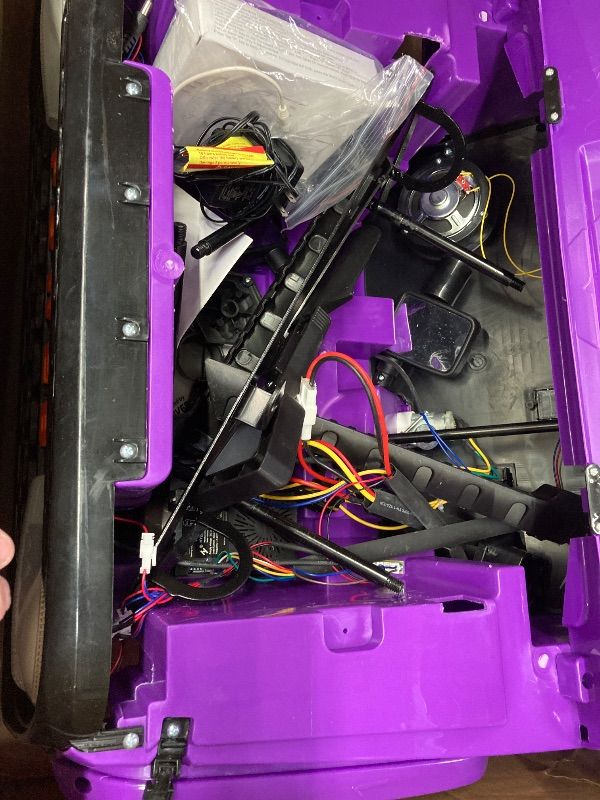 Photo 1 of ***SELLING AS PARTS ONLY***24V Ride on Car Toys, Remote Control 4 Wheels Electric Power Car for Toddlers Kids Boys Girls, 2 Seater Motorized Ride on Cars Vehicle, Purple