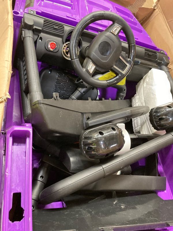 Photo 1 of ***SELLING AS PARTS ONLY***24V Ride on Car Toys, Remote Control 4 Wheels Electric Power Car for Toddlers Kids Boys Girls, 2 Seater Motorized Ride on Cars Vehicle, Purple