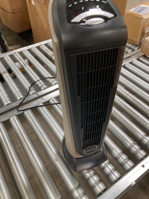Photo 1 of ***MISSING REMOTE -SELLING AS IS *** Lasko 1500W Ceramic Tower Space Heater with Remote, Thermostat, Timer & Widespread Oscillation, Portable Electric Heater for Indoor Use, Bedroom & Living Room, 751320