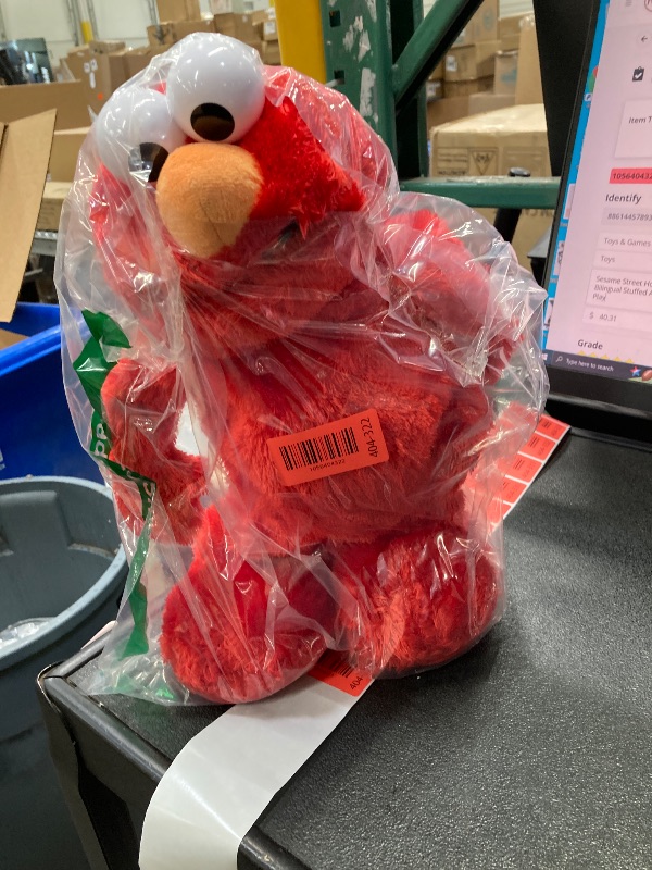 View 2 of **MISSING BATTERY COVER/TAPE RESIDUE ON FACE**Sesame Street Hokey Pokey Elmo Plush with Music and Motion, 36 Cm Bilingual Plush, Ages 18 Months+