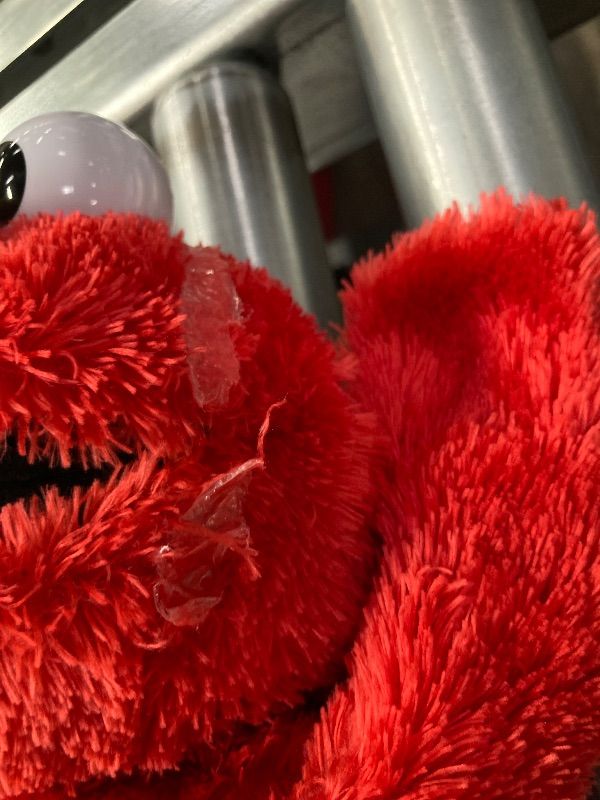 View 5 of **MISSING BATTERY COVER/TAPE RESIDUE ON FACE**Sesame Street Hokey Pokey Elmo Plush with Music and Motion, 36 Cm Bilingual Plush, Ages 18 Months+