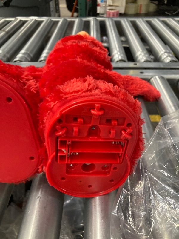 View 4 of **MISSING BATTERY COVER/TAPE RESIDUE ON FACE**Sesame Street Hokey Pokey Elmo Plush with Music and Motion, 36 Cm Bilingual Plush, Ages 18 Months+