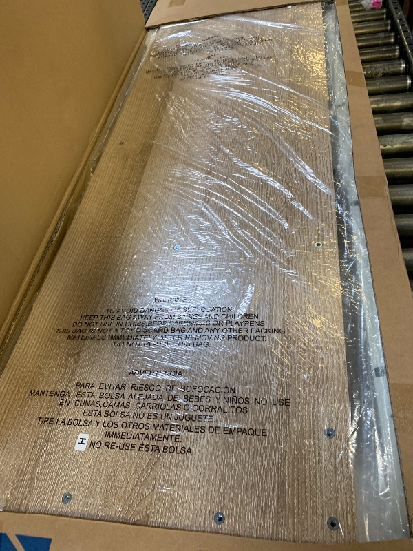 Photo 1 of SHW 55 x 28 Inches Electric Height Adjustable Standing Desk with Drawer and Memory Preset, Maple