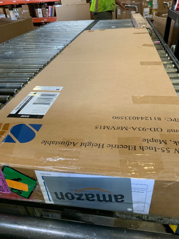 Photo 1 of SHW 55 x 28 Inches Electric Height Adjustable Standing Desk with Drawer and Memory Preset, Maple