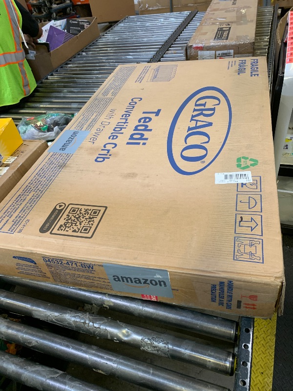 Photo 1 of Graco Teddi 5-in-1 Convertible Crib with Drawer – GREENGUARD Gold Certified, Full-Size Nursery Storage Drawer, Baby Crib Converts to Toddler Bed, Daybed and Full-Size Bed (White and Driftwood)