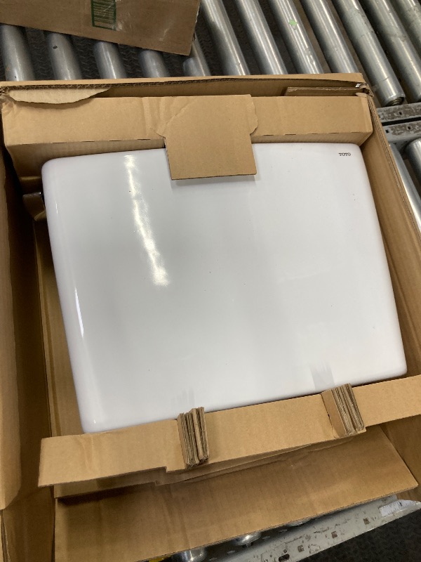 Photo 1 of ** tank with lid only** TOTO Drake Two-Piece Elongated 1.28 GPF TORNADO FLUSH Toilet with CEFIONTECT, Cotton White - CST776CEG#01