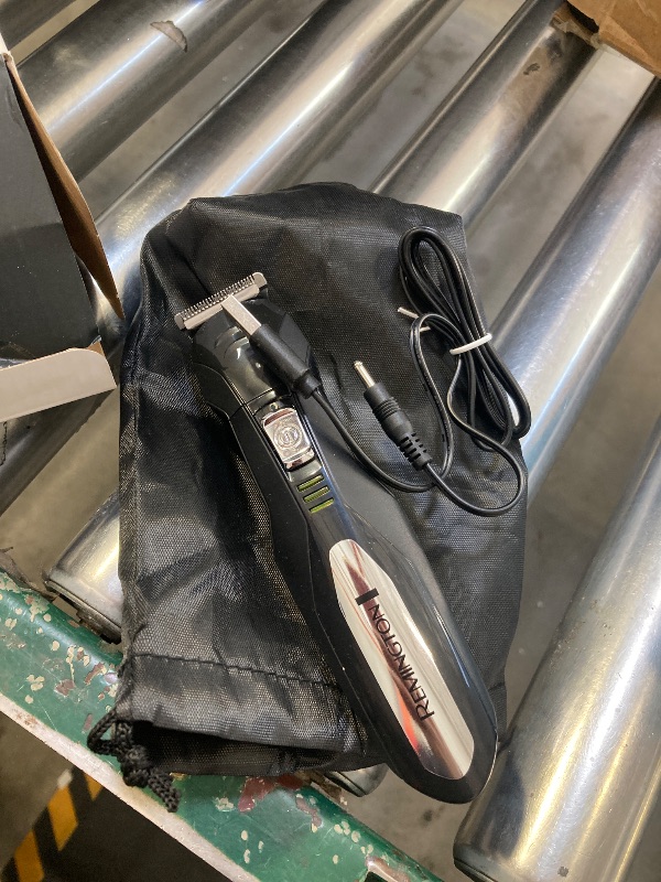 Photo 1 of Remington All-in-One Grooming Kit, Lithium Powered, 8 Piece Set with Trimmer, Men's Shaver, Clippers, Beard and Stubble Combs, PG6025, Black