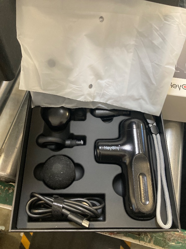 Photo 1 of HEYCHY Super Mini Massage Gun Deep Tissue, Handheld Muscle Massager with 4 Heads, Percussion Travel Size Massager Gun for Back Pain Relief, Quiet for Home, Gym, Office, Perfect for Men & Women, Black