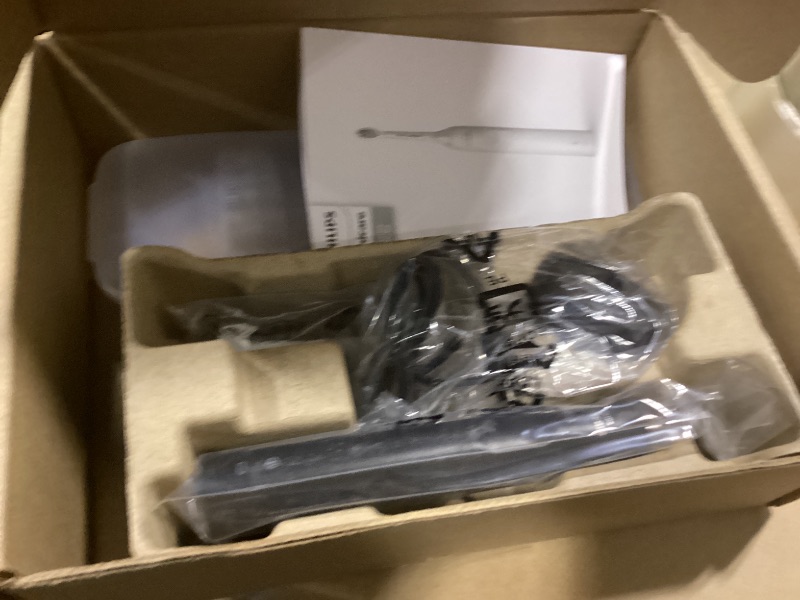 Photo 1 of Philips Sonicare 4100 Rechargeable Electric Toothbrush, Advanced Plaque Removal, Pressure Sensor, Includes Brush Head Case, Black BD5003AZ