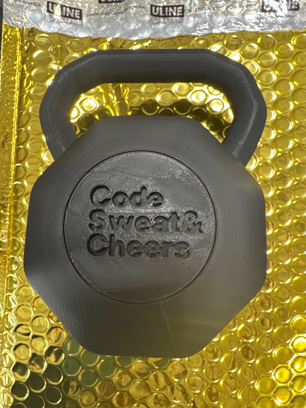 Photo 1 of NIKE Black Plastic Kettlebell for Decor