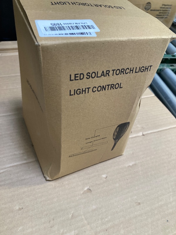Photo 1 of Upgraded Solar Lights Outdoor 4 Pack, Solar Torch Lights with Flickering Flame, Super Larger Size for Garden Decor, Solar Powered Outdoor Waterproof Solar Garden Lights for Pathway Patio Yard