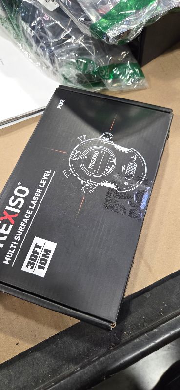 Photo 1 of PREXISO Multi Surface Laser Level LED Light Vial, 30Ft Horizontal & Vertical Line Laser with Wall Mount Base, 2 Pins, 10 Sticker, 2 AA Batteries for Hanging Frames & Picture, Construction Wall Writing