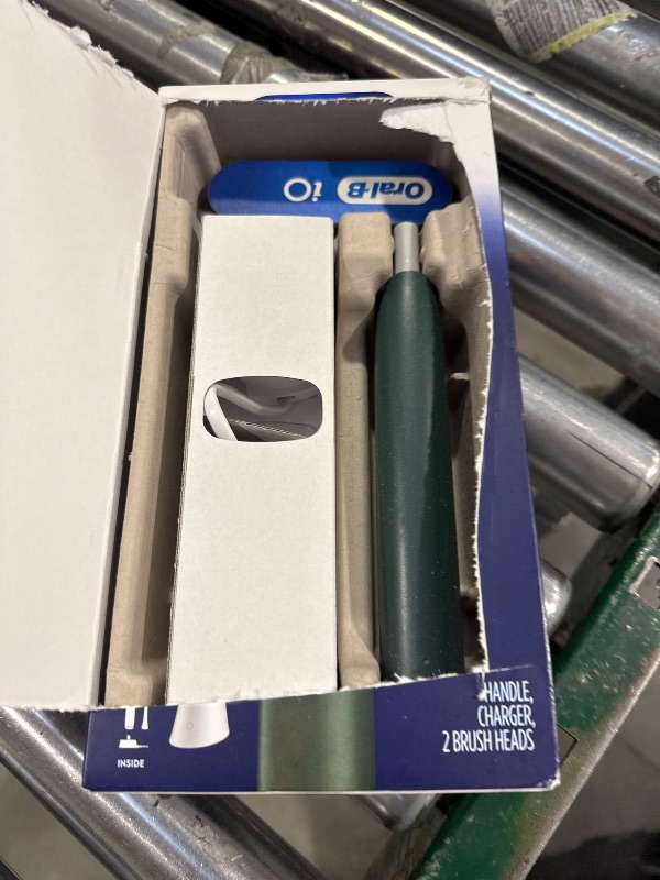 Photo 1 of Oral-B Rechargeable Electric Toothbrush, iO2 Starter Kit, 3 Cleaning Modes, Automatic Pressure Sensor to Protect Gums, 2 Brush Heads, Forest Green