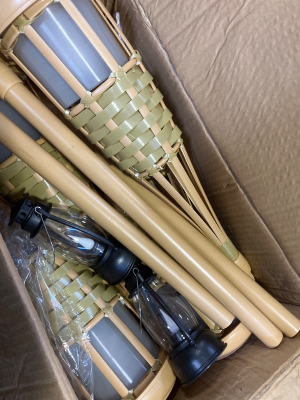 Photo 1 of Evelynsun Solar Outdoor Lights, Solar Torch Lights Outdoor Flickering Flame, Outdoor Decorations for Patio Path Yard - 4 Pack