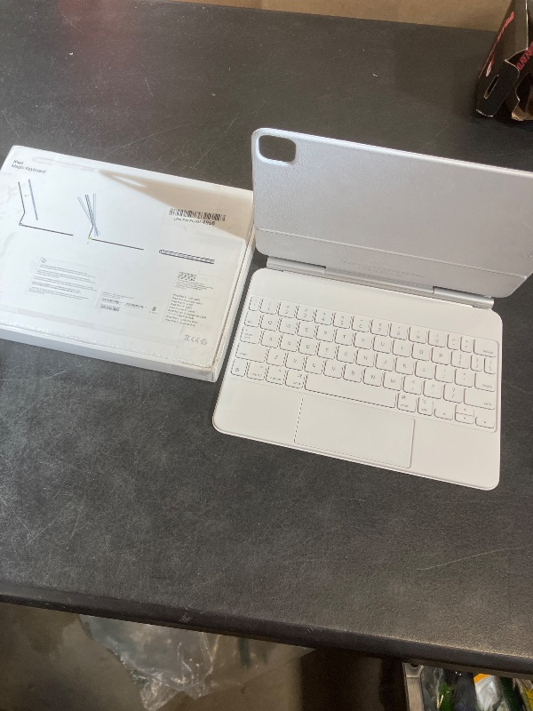 Photo 1 of Apple iPad Magic Keyboard Case for iPad Pro 11-inch (M4 and M5), Great Typing Experience, Built-in Trackpad, Function Row, US English - White