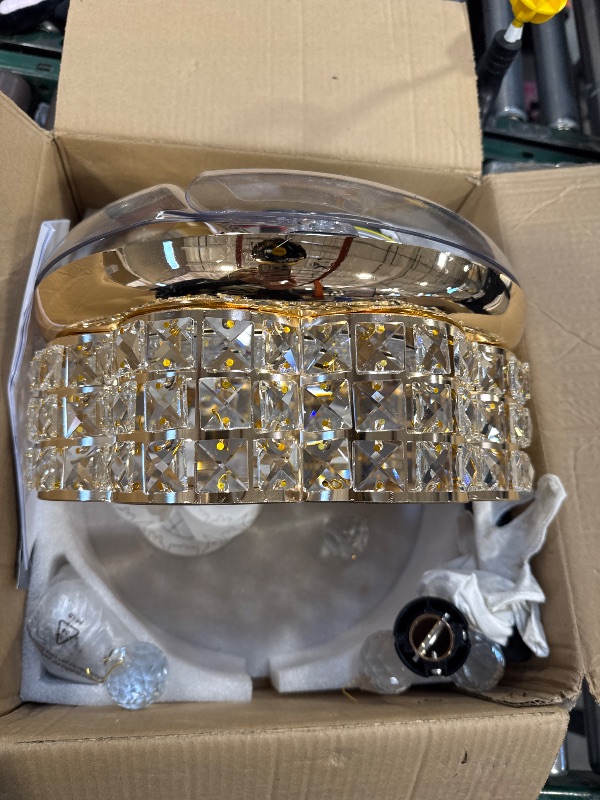 Photo 1 of **DAMAGED** Fejanical 30" Crystal Chandelier Ceiling Fan, Dimmable Retractable Ceiling Fan with Lights, Crystal Fandeliers with Lights and Remote for Bedroom Living Room, Gold
