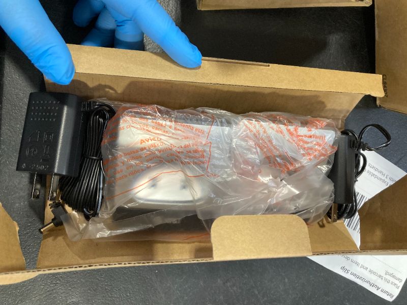 Photo 1 of AT&T CL84307 Dect 6.0 Expandable Corded/Cordless Phone with Smart Call Blocker, Silver/Black with 3 Handsets