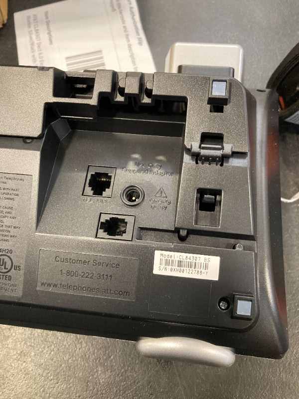 Photo 1 of AT&T CL84307 Dect 6.0 Expandable Corded/Cordless Phone with Smart Call Blocker, Silver/Black with 3 Handsets