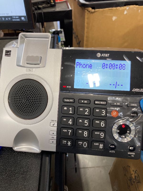 Photo 1 of AT&T CL84307 Dect 6.0 Expandable Corded/Cordless Phone with Smart Call Blocker, Silver/Black with 3 Handsets