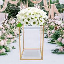 Photo 1 of \ Metal Flower Floor Vase Column Flower Stand Geometric Centerpieces Vase for Tables, 15¾ inch Tall Gold Flower Holder for Home Party Wedding Decorations, Rectangular Flower Display Rack
