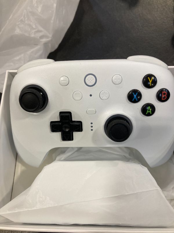 Photo 1 of 8Bitdo Ultimate 2 Wireless Gaming Controller with TMR Joysticks, Switchable Hall Effect/Tactile Triggers, 8Speed Wireless Tech, Charging Dock, RGB Fire Ring for PC & Android - White