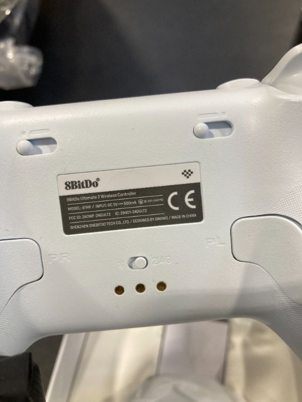 Photo 1 of 8Bitdo Ultimate 2 Wireless Gaming Controller with TMR Joysticks, Switchable Hall Effect/Tactile Triggers, 8Speed Wireless Tech, Charging Dock, RGB Fire Ring for PC & Android - White