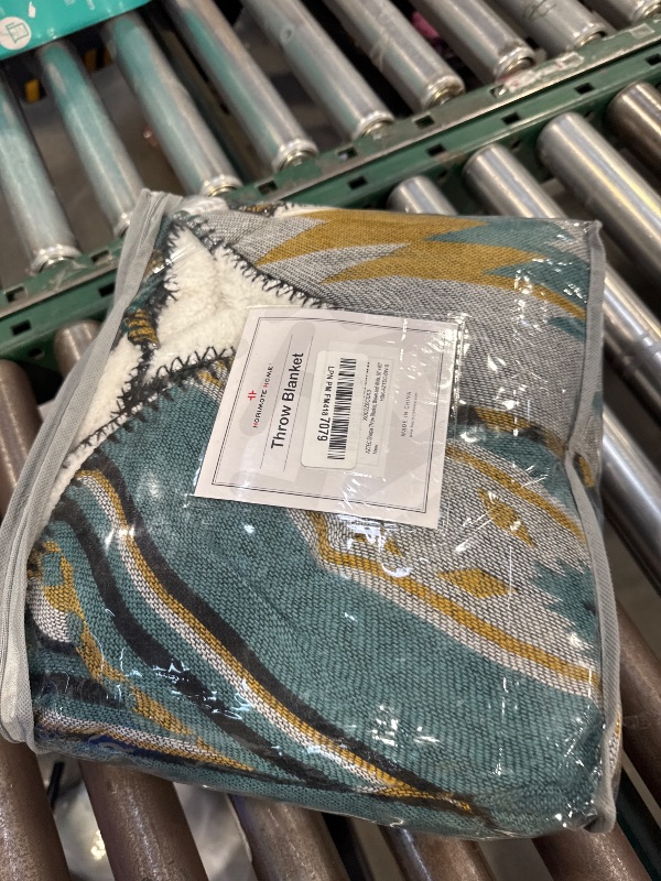 Photo 1 of Aztec Patterned Throw Blanket with Soft Sherpa Lining, Traditional Southwestern Navajo Tribal Style Warm Throw for Camping, Outdoor, Light Weight Cozy Boho Blanket for Couch, Sofa, Bed, 50”x60”, Teal