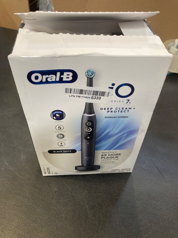 Photo 1 of Oral-B iO Deep Clean + Protect Rechargeable Electric Toothbrush, Black, iO Series 7, 2 Replacement Brush Heads, Charging Travel Case