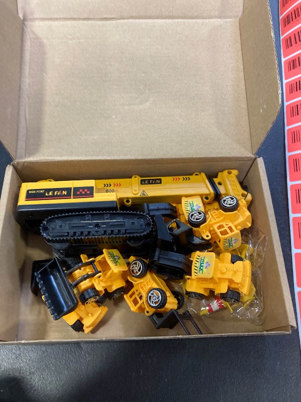 Photo 1 of RAYNAG 16 Pieces Construction Cake Topper Vehicles Cake Decoration Set Construction Birthday Party Supplies Large Crane Excavator Traffic Road Sign Cake Topper for Birthday Party Supplies Favours