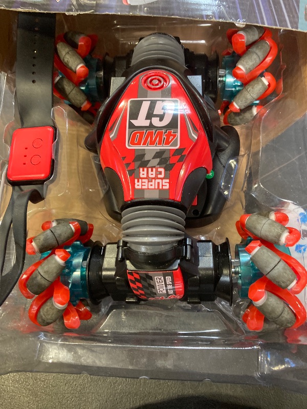 Photo 1 of 1:12 Gesture Sensing RC Stunt Car, 2 * 1200mAh Hand Controlled Remote Control Twist Cars with Light & Music, 4WD 360° Rotate Transform Drift, Gifts for 8-12 Kids Age 8 9 10 11 12 Yrs Old? Trains-Red