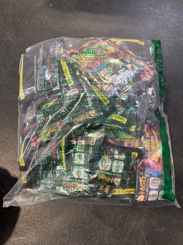 Photo 1 of HGD (50 Pack) Fire Color Changing Packets for Fire Pit, Indoor/Outdoor Fireplace, Campfires, Bonfires - Mystical Rainbow Magic Flames, Camping Accessories for Family Entertainment