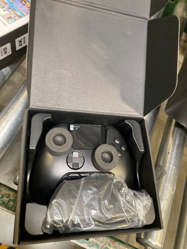 Photo 1 of ManbaOne Interactive Screen Wireless Gaming Controller for PC/Switch/Switch 2/iOS/Android,Hall Effect Stick & Trigger,RGB Lighting,Remappable Buttons,1800mAh with Charging Dock (Black)