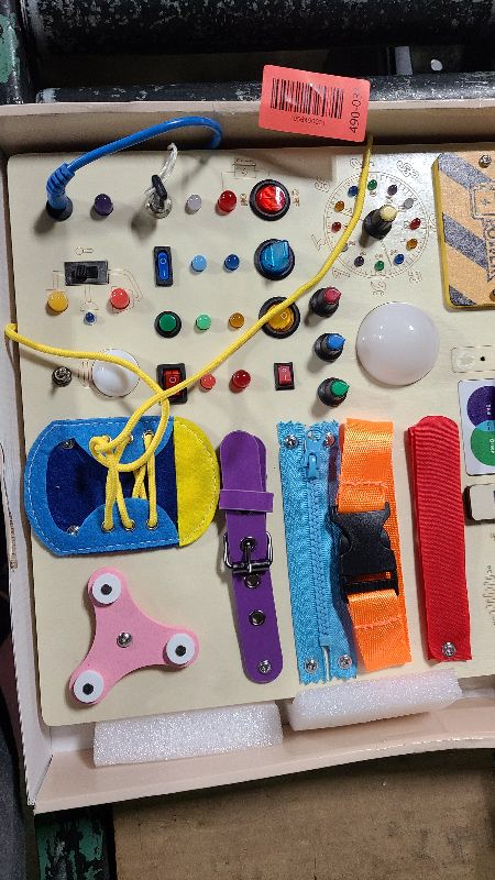 Photo 1 of 23 in 1 Busy Board Montessori Toys for 1-3 Year Old Wooden Learning Educational Toy for Toddlers with 15 Switches, 26 LED Lights, Music boxes, Locks,Zippers Toddler Sensory Toys for Soothing A Baby