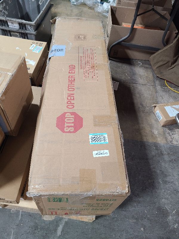 Photo 1 of National Tree Company 9 ft Pre-lit Artificial Christmas Tree, Dunhill Fir, 800 Clear Lights, 2,100 Tips, Slim Profile, Includes Stand, Green