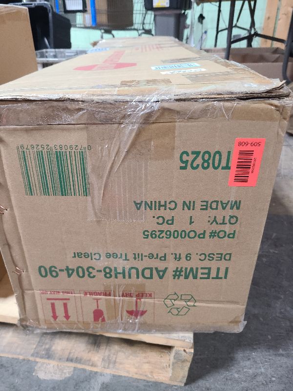 Photo 1 of National Tree Company 9 ft Pre-lit Artificial Christmas Tree, Dunhill Fir, 800 Clear Lights, 2,100 Tips, Slim Profile, Includes Stand, Green