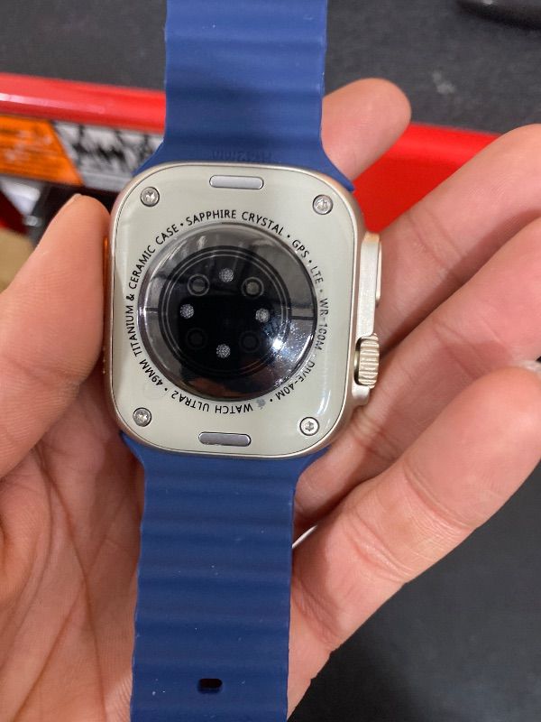 Photo 6 of locked***********************************Apple Watch Ultra 2 [GPS + Cellular, 49mm] - Titanium Case with Blue Ocean Band, One Size (Renewed)