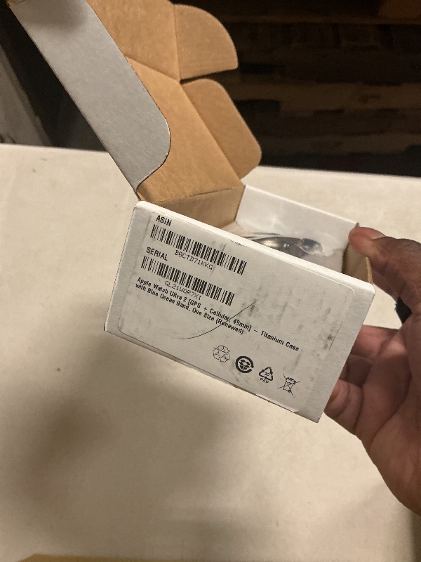 Photo 1 of locked----------------------------------Apple Watch Ultra 2 [GPS + Cellular, 49mm] - Titanium Case with Blue Ocean Band, One Size (Renewed)