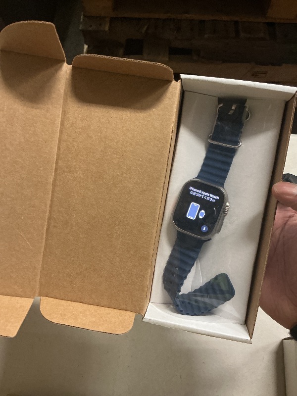 Photo 1 of locked----------------------------------Apple Watch Ultra 2 [GPS + Cellular, 49mm] - Titanium Case with Blue Ocean Band, One Size (Renewed)